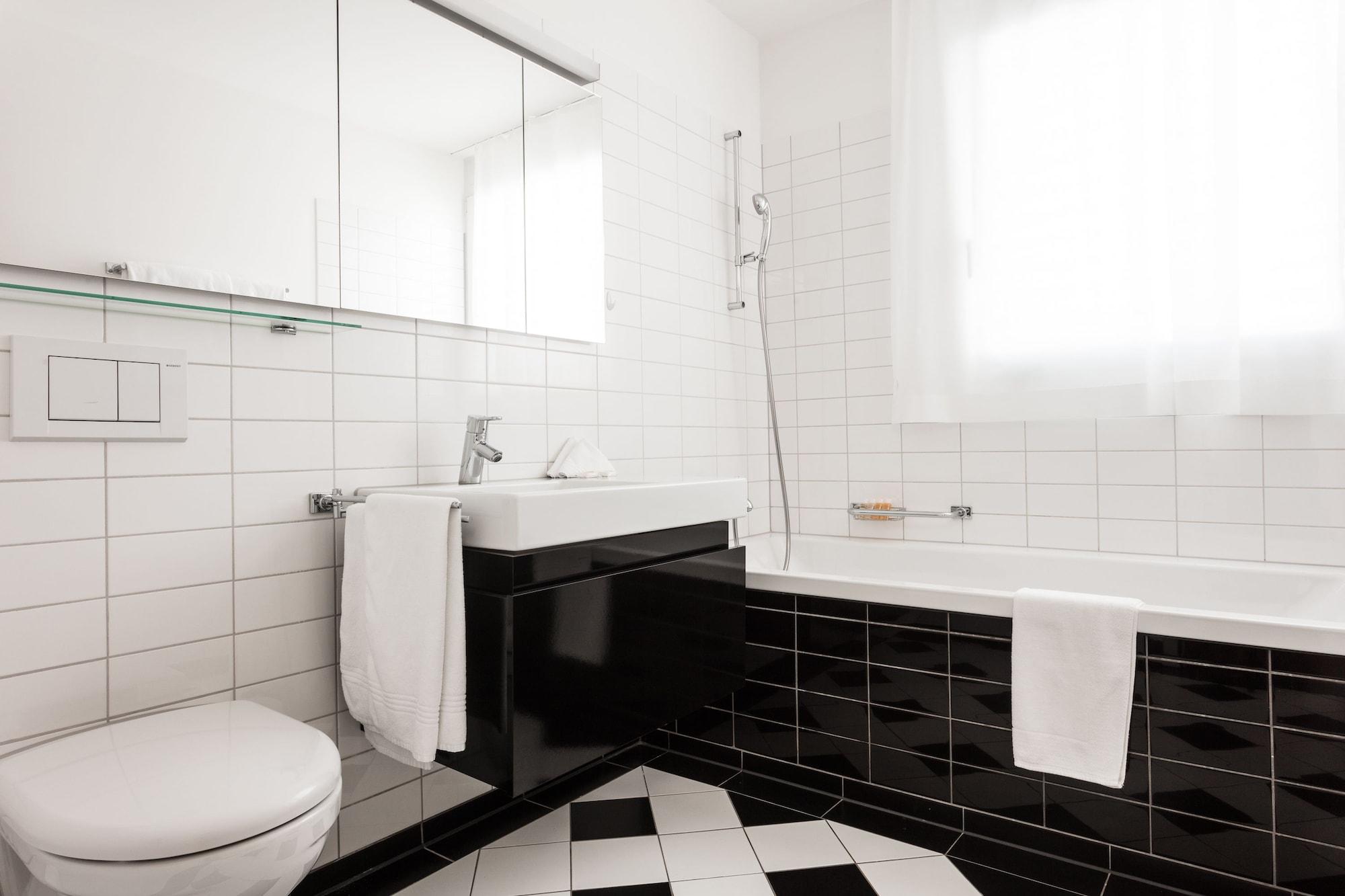 Ema House Serviced Apartments Seefeld Цюрих Экстерьер фото
